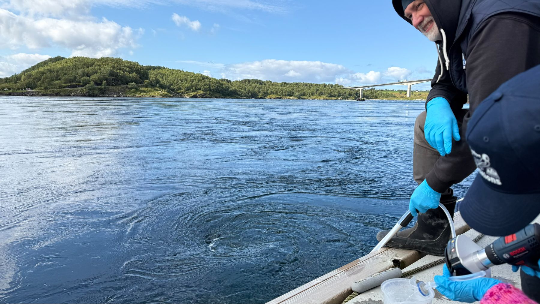 Pumping water with the peristaltic pump from the Saltstraumen channel, where tide changes the current direction every six hours. Saltstraumen, Norway, August 2026.