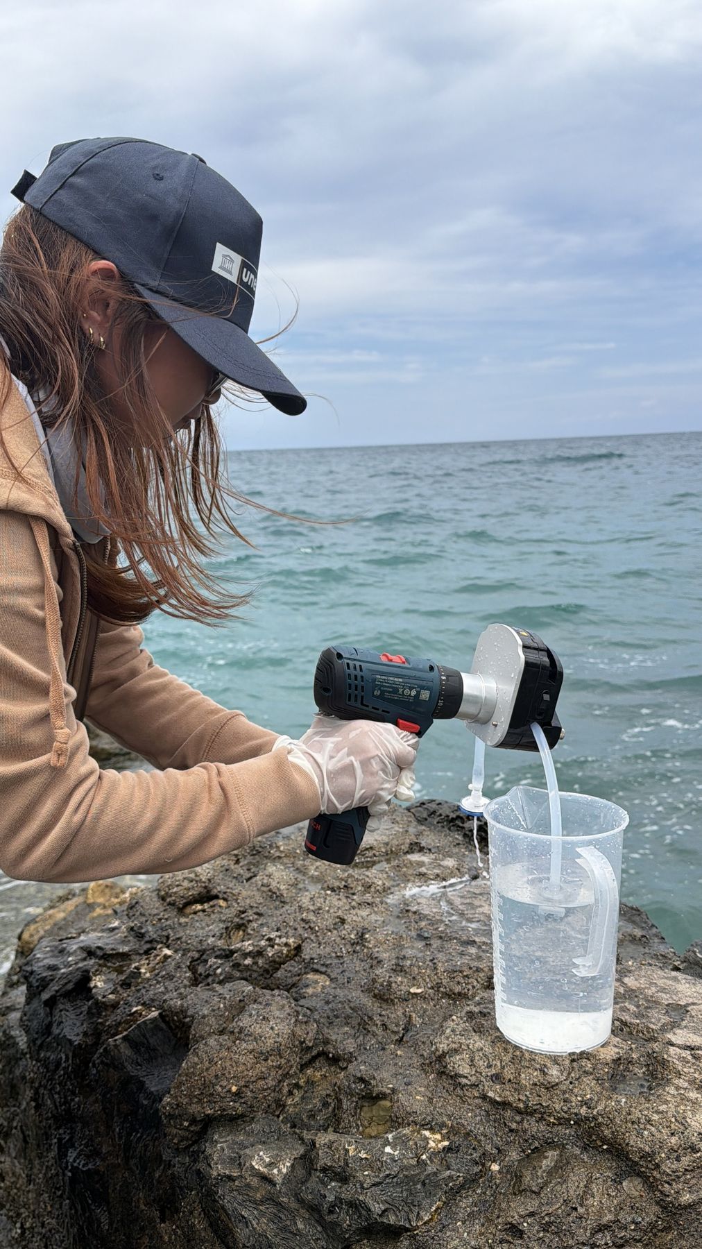 On-site filtering using the peristaltic pump. Iligan Bay, Philippines, August 2026.