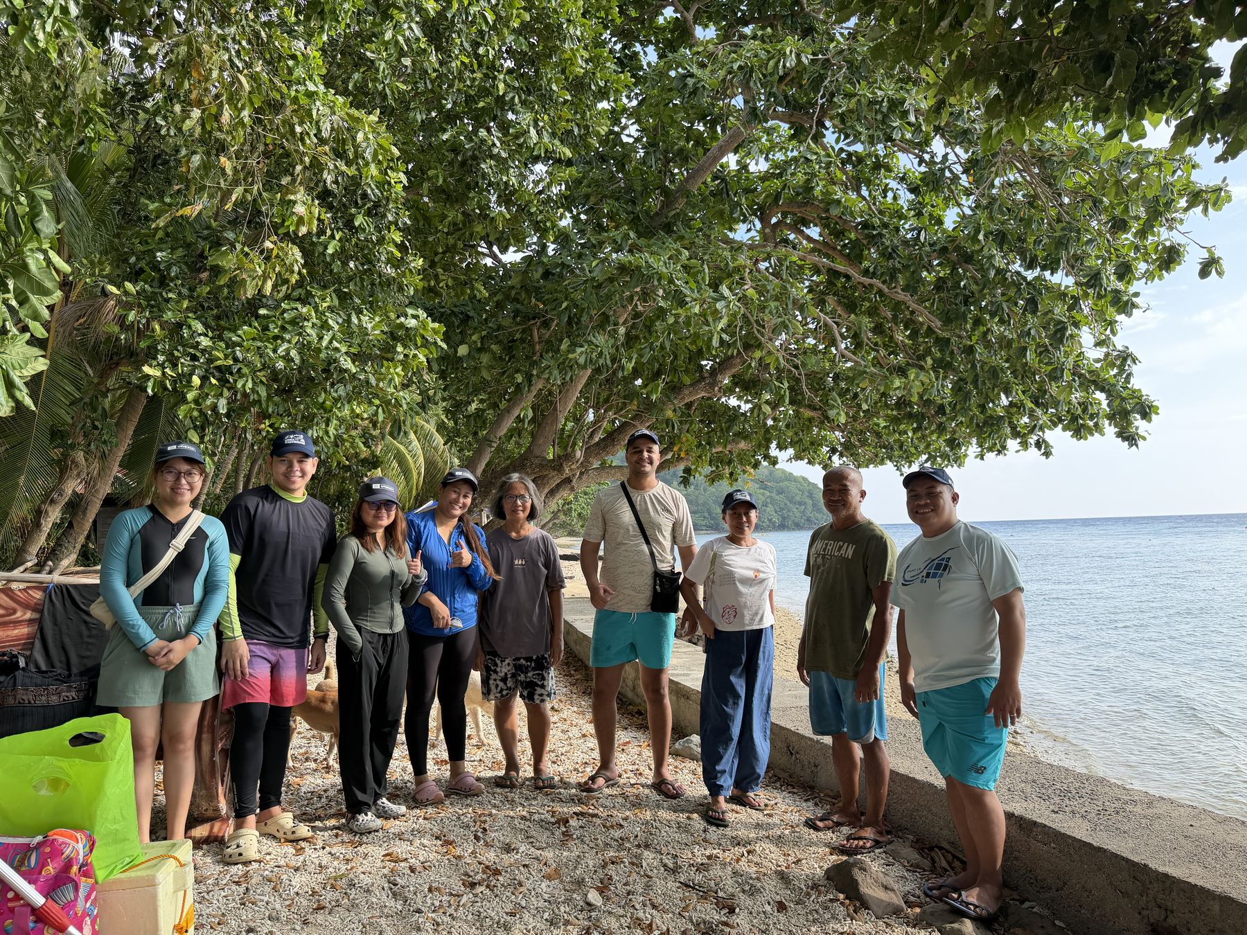 The eDNA Expeditions 2026-2028 team for the Philippines poses with Bantay Dagat at the Giant Clam Sanctuary. Camiguin Island, Philippines, September 2026.